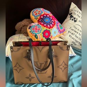 Louis Vuitton On The Go bag Tote MM